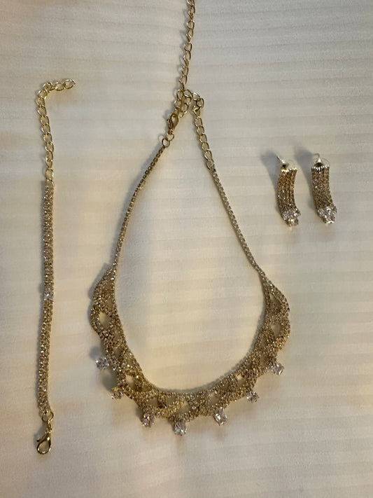 Gold earrings bracelet and necklace set